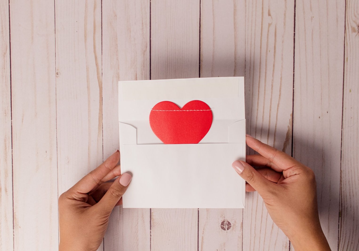 white and red heart print card